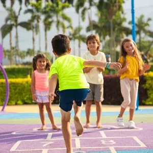 Kids playing hopscotch outdoors