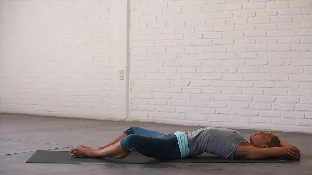 Person lying in supine butterfly