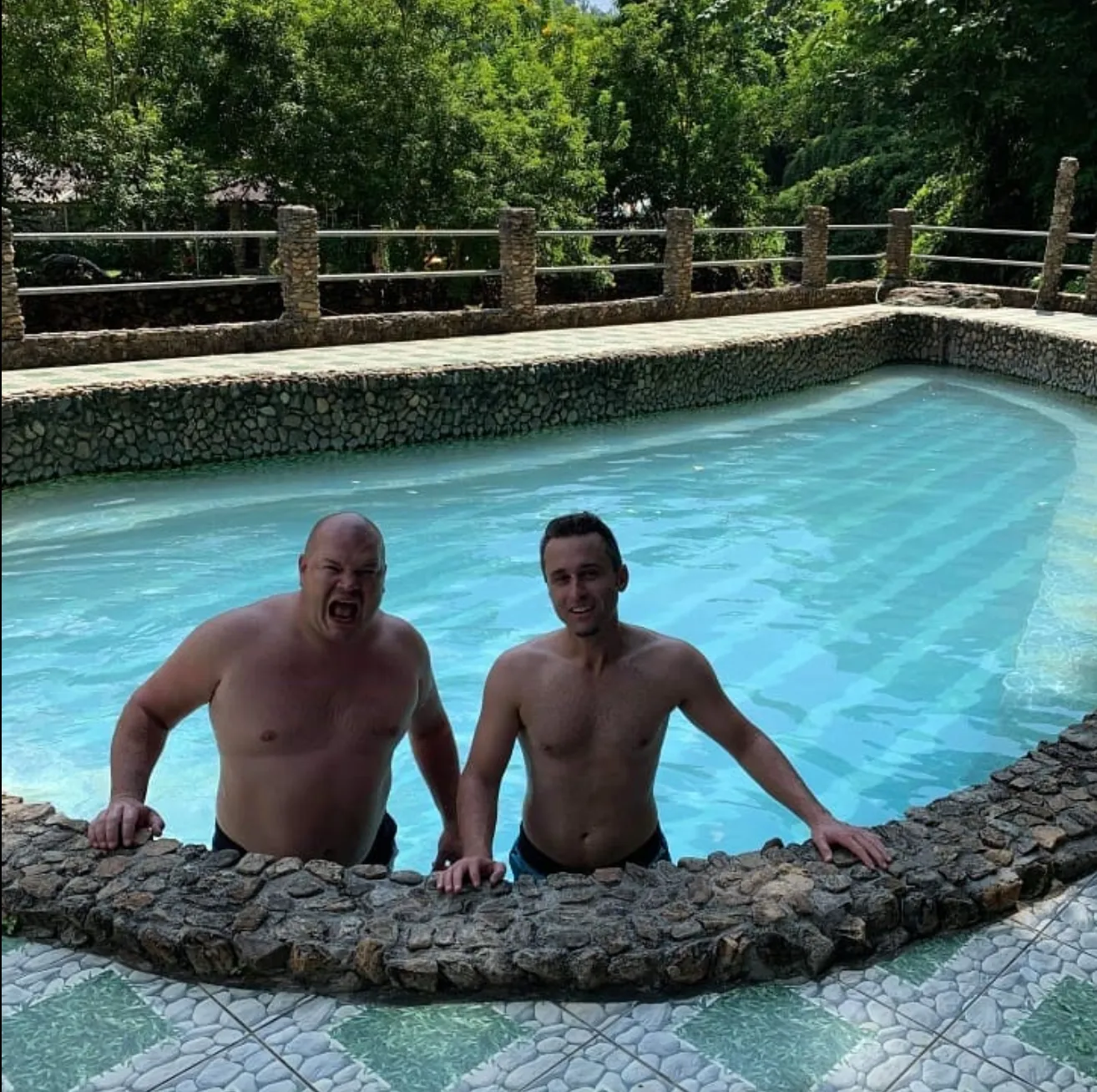Two people in a pool