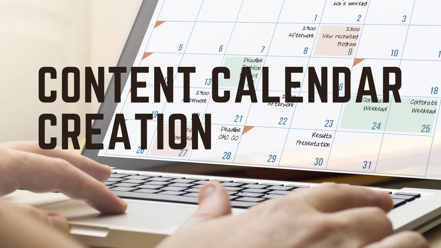 Hands typing next to a content calendar