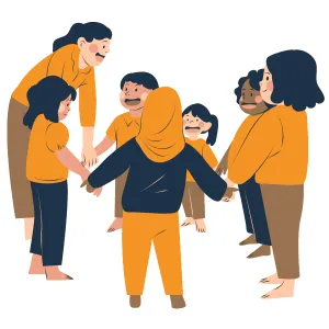 Group of people with their hands joined in the middle