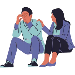 Woman comforting a man