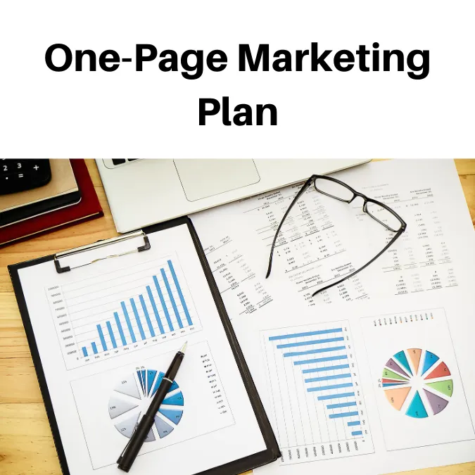 One-page marketing plan with charts on a desk