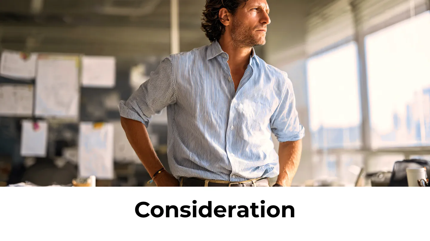 Consideration: man thinking in an office