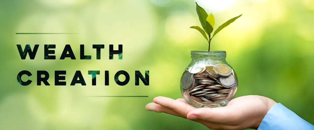 Wealth creation: hand holding a jar of coins with a plant