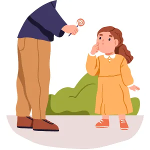 Parent offering a lollipop to a shy child