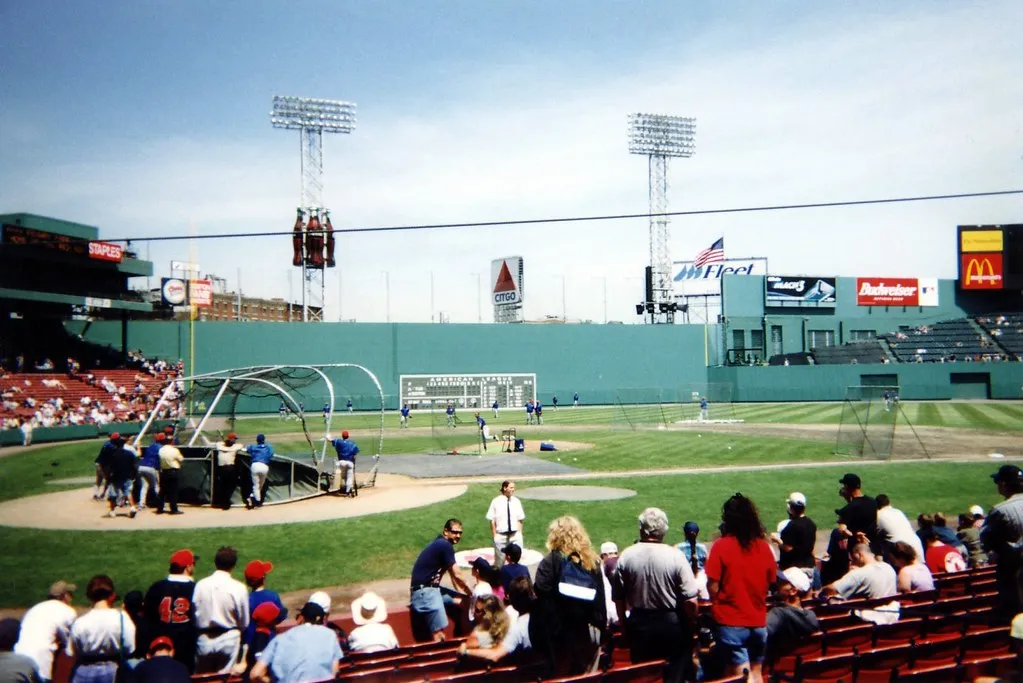 Baseball team practicing on a field in a stadium